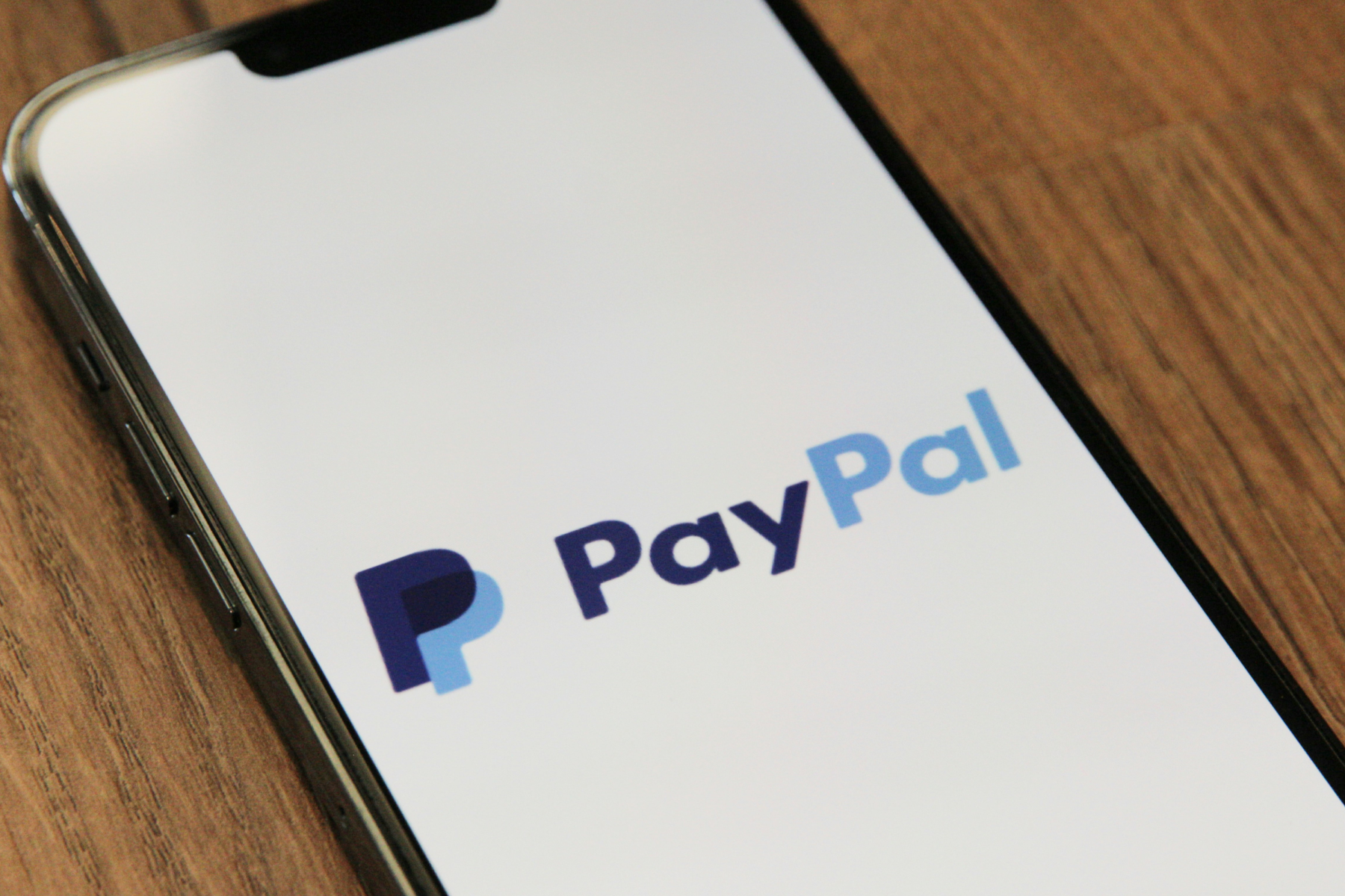 PayPal logo displayed on smartphone screen.