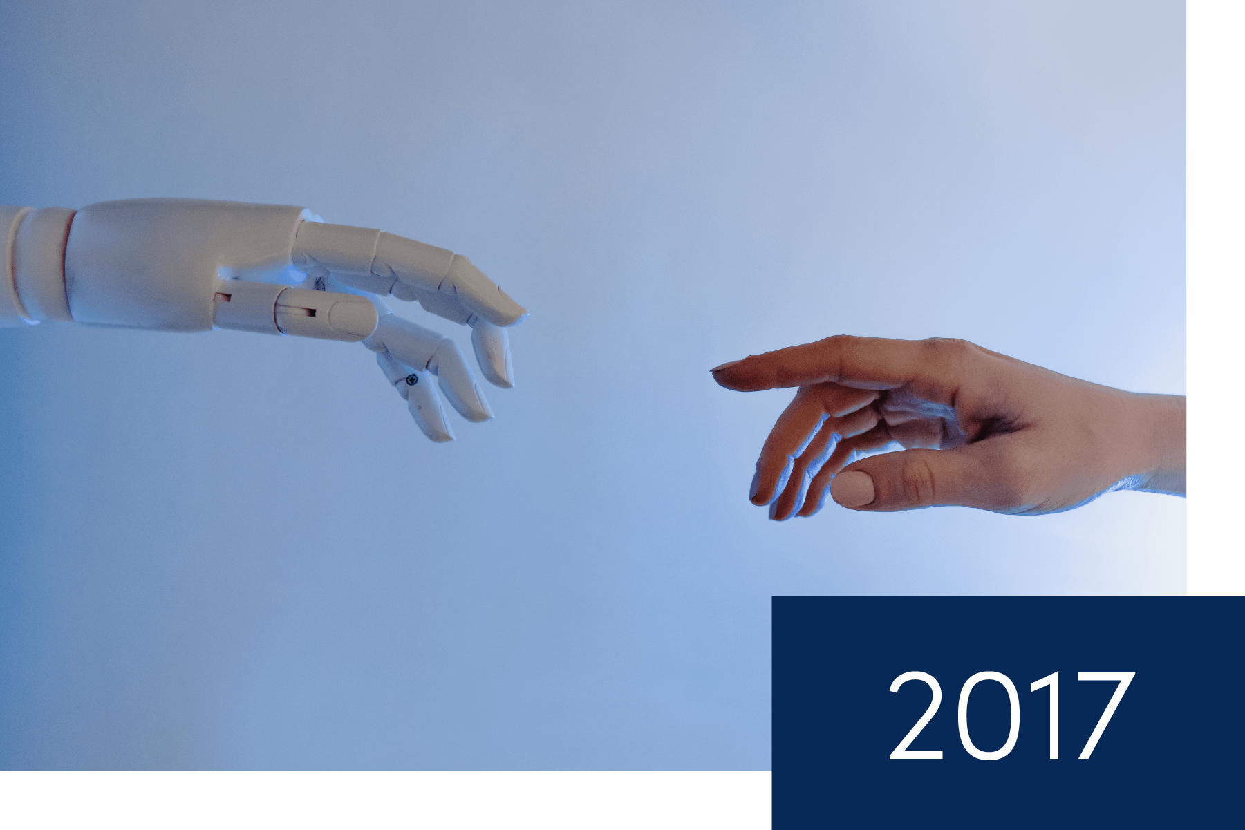 robot hand reaching to human hand