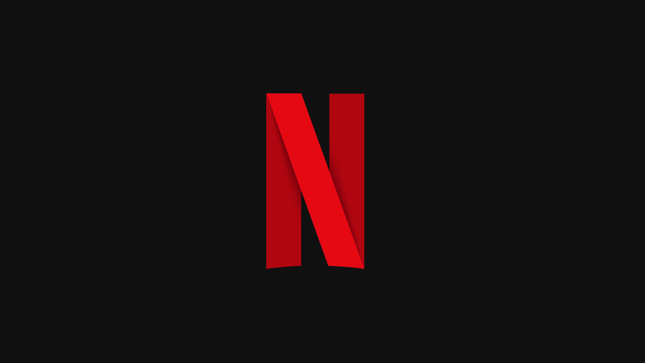 Netflix logomark: Stylized red 'N' with curved edge on a black background.