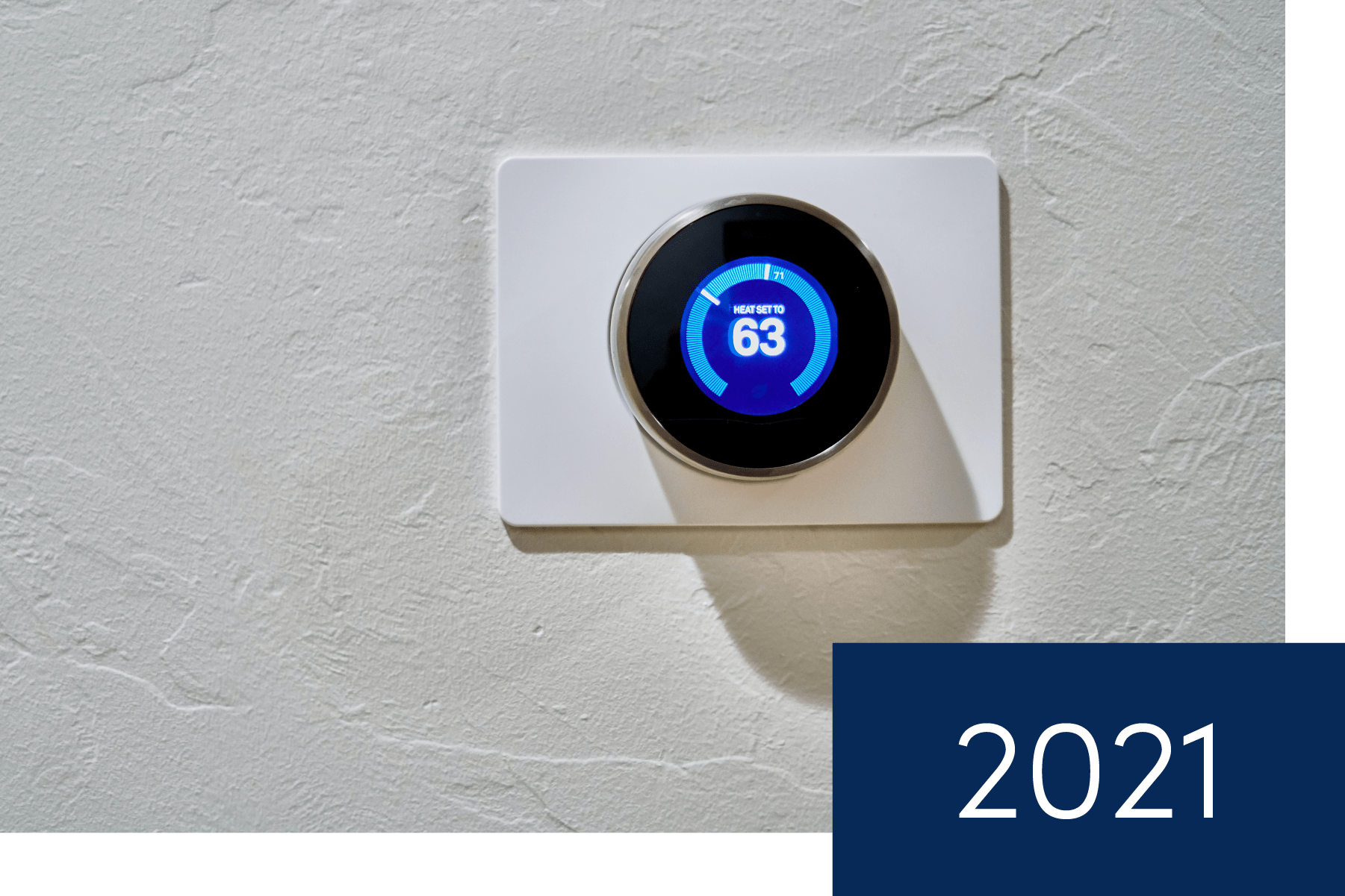 IoT smart thermostat on wall